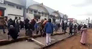 ظهور بؤر عدوى بوحدات صناعية يقوض شهرين من جهود منع تفشي كوفيد 19